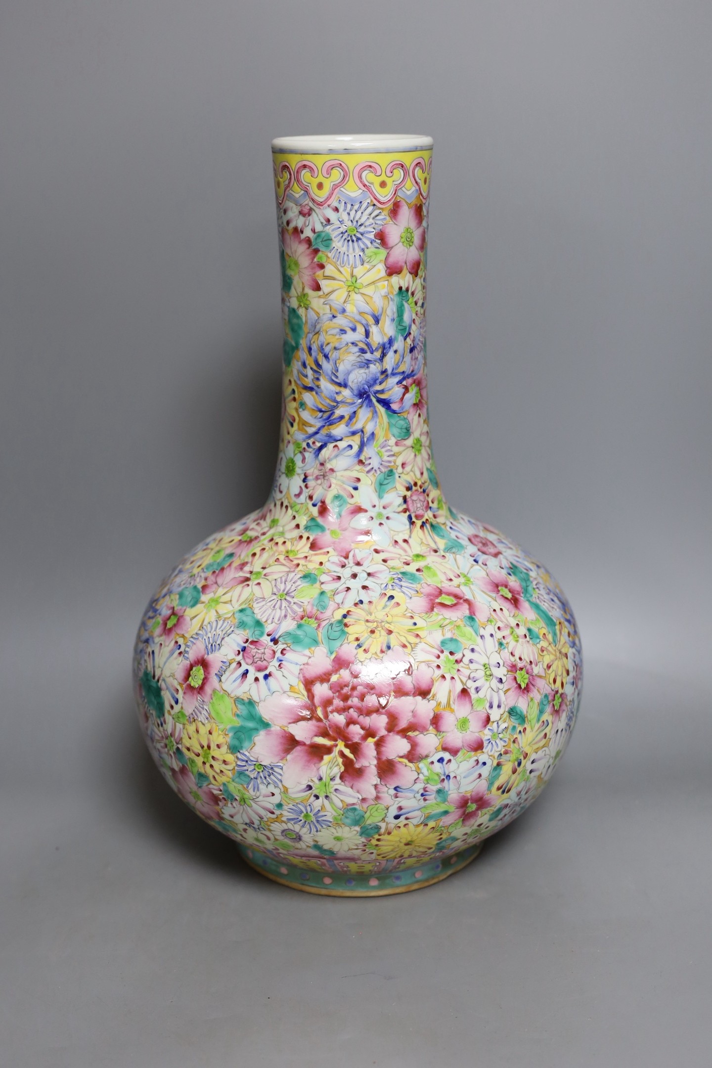 A Chinese famille rose millefleur vase, 40cms high.